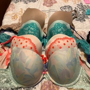 4 used Victoria’s Secret bras. Size 34 DD.